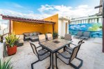 Your private roof deck with lounge chairs, patio table, BBQ, outdoor shower and pool view